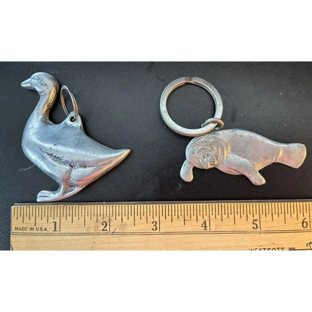 Set of 2 Silver Metal Keychains, Goose and Manatee